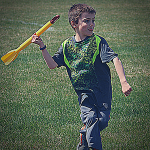 Track and Field class for kids. A student about to throw a javelin.